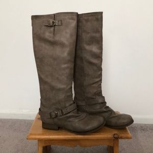 Distressed brown riding boots